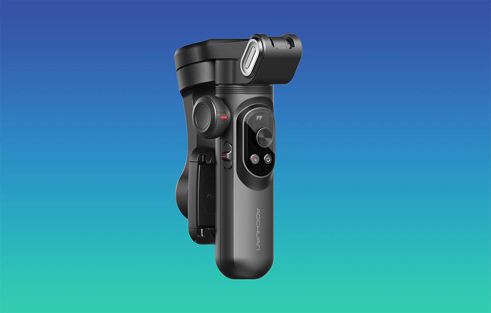 Un gimbal negru pliat prezentat pe un fundal cu gradient ca un dispozitiv compact.