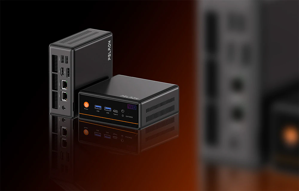 Două mini PC-uri negre pe un fundal portocaliu și negru degradat.