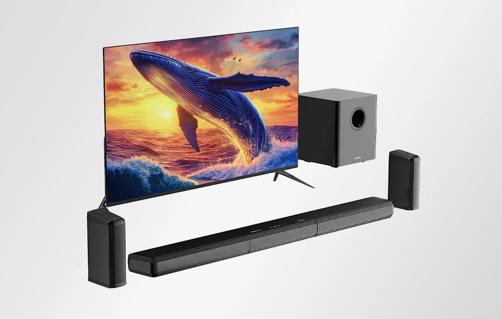 Subwoofer, bară de sunet, difuzoare și televizor pe fundal alb