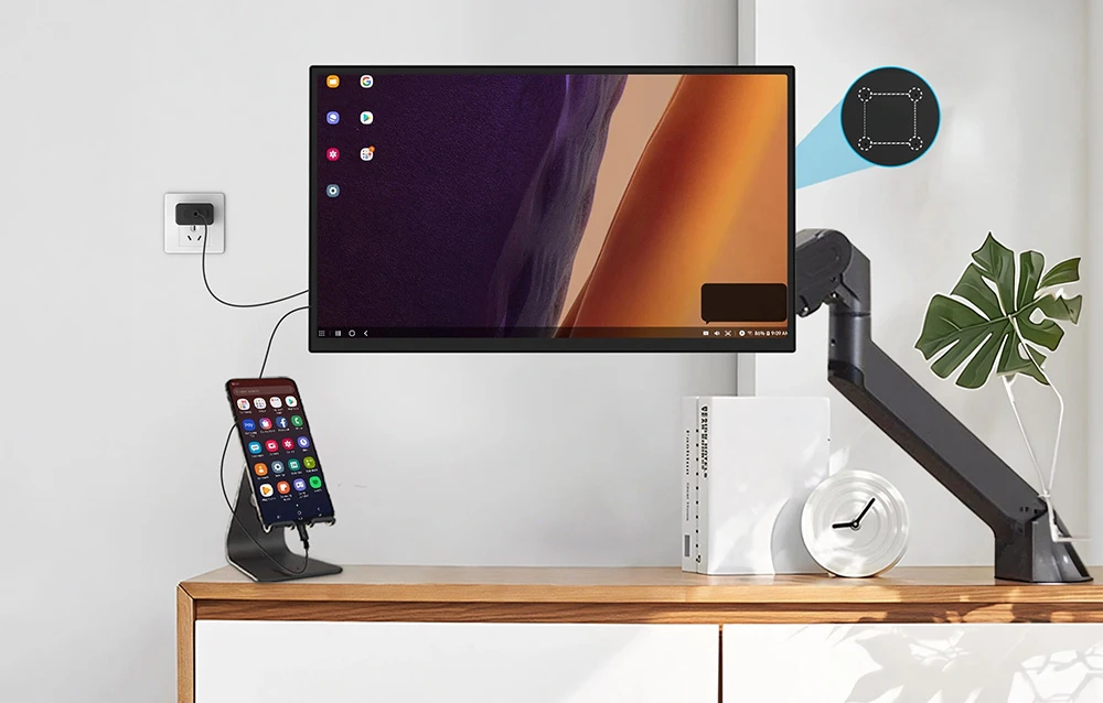 Monitor ZEUSLAP montat pe un braț de birou reglabil și conectat la un smartphone