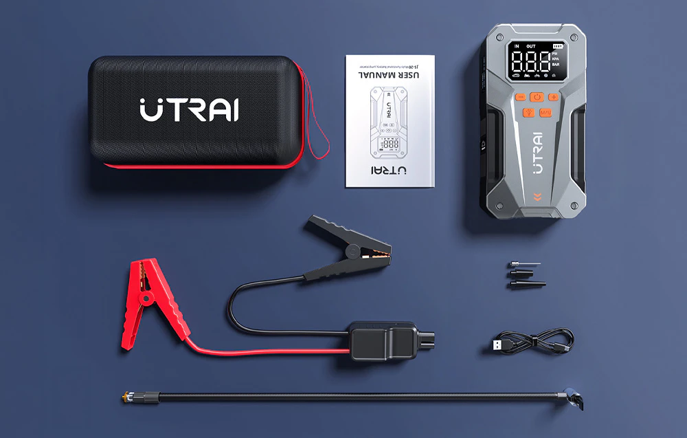 Un încărcător de urgență și un set de accesorii, inclusiv o husă, manualul de instrucțiuni, cabluri cu cleme și conectori.
