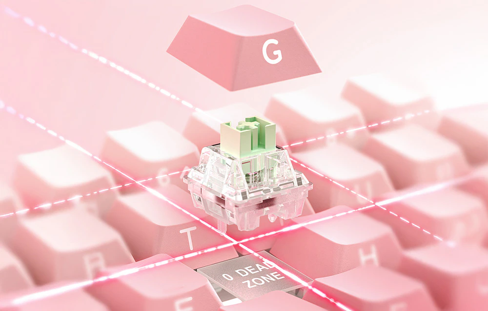 Comutator verde deasupra tastaturii roz
