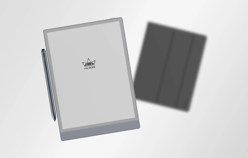 Tabletă Huion cu ecran e-paper și stylus fixat pe carcasa neagră pătată.