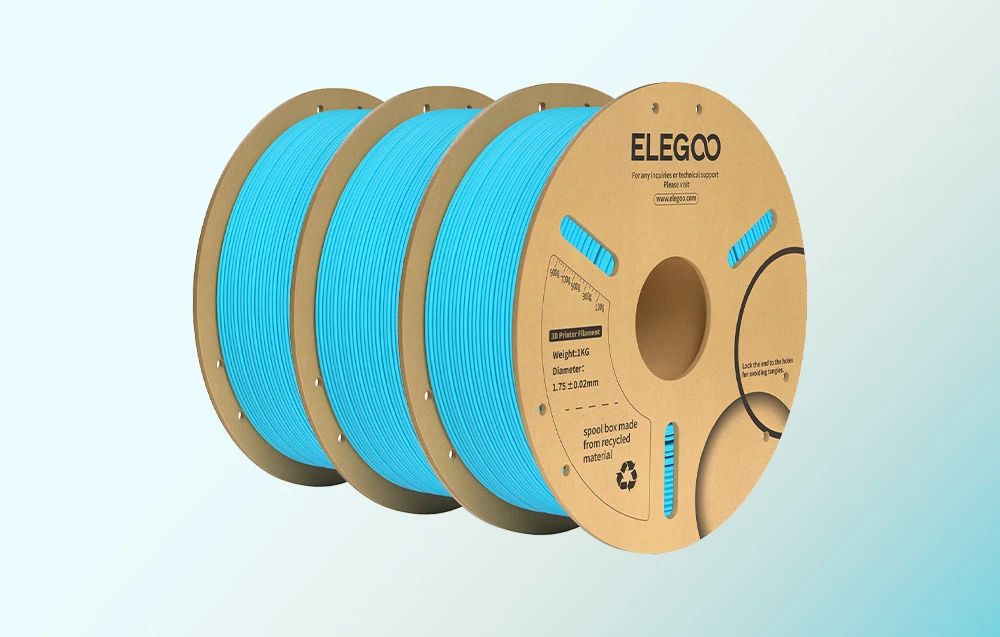 Trei bobine de filament în culoarea albastru
