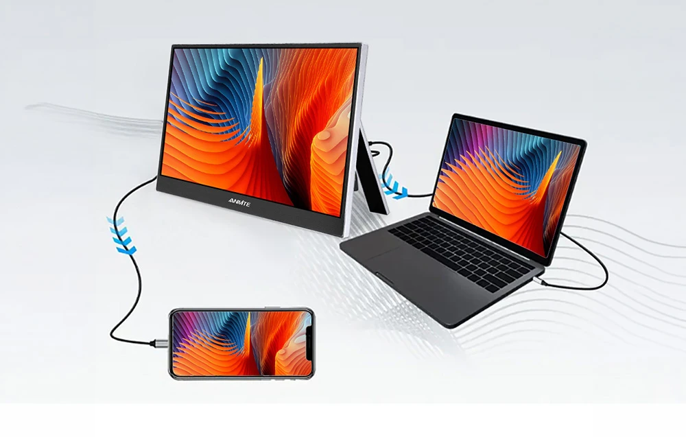 Un ecran ANMITE conectat prin cabluri la un laptop deschis și la un smartphone așezat lângă acesta, pe un fundal de culoare deschisă.
