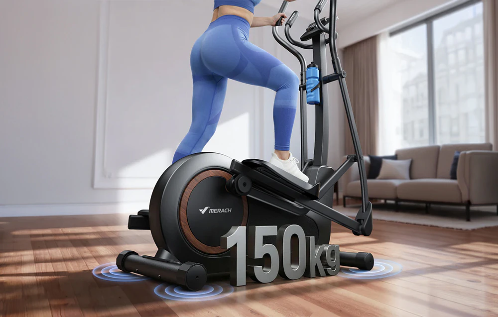 O femeie îmbrăcată în colanți albaștri face exerciții pe un aparat eliptic Merach într-o cameră luminoasă, cu o capacitate de încărcare de 150 kg