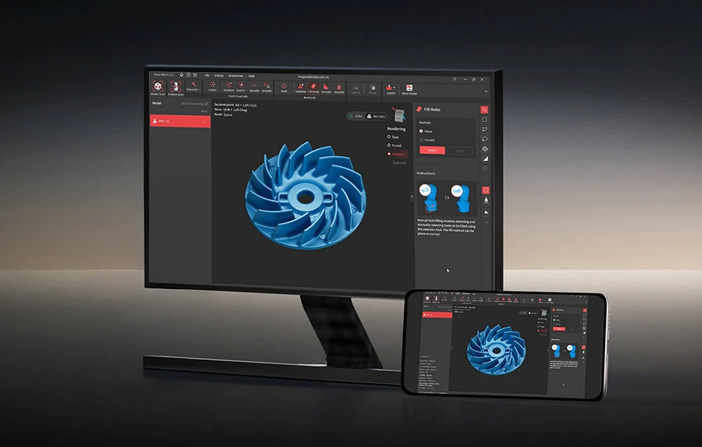 Monitor și tabletă care afișează un model 3D