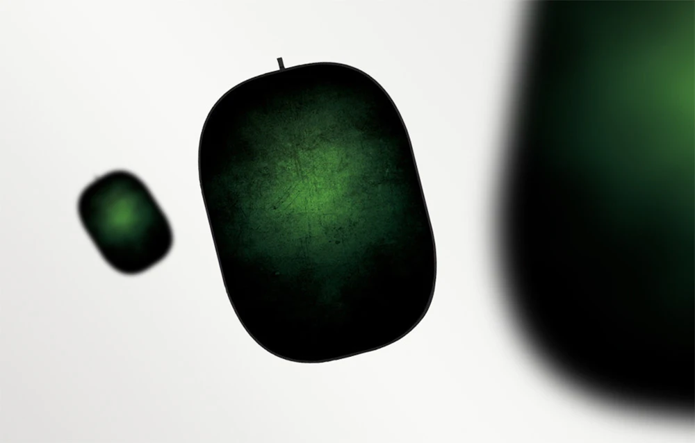 Trei fundaluri fotografice verzi Godox pe un fundal cu gradient gri