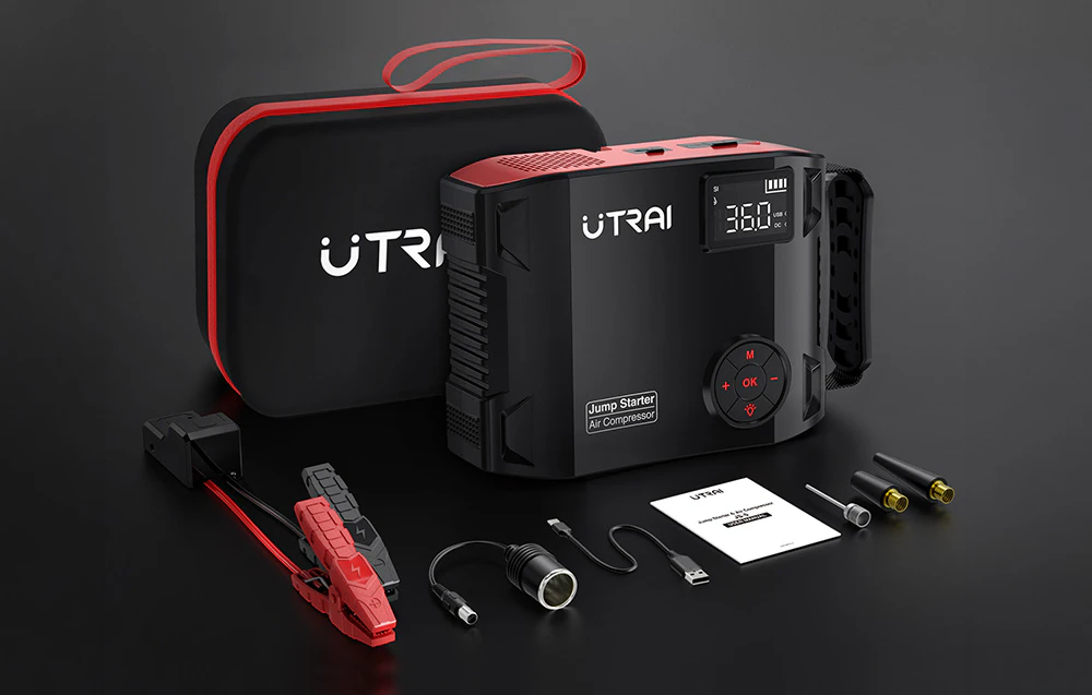 Un set complet de pornire de urgență pentru mașină cu accesorii, un manual de utilizare și o geantă de călătorie neagră.