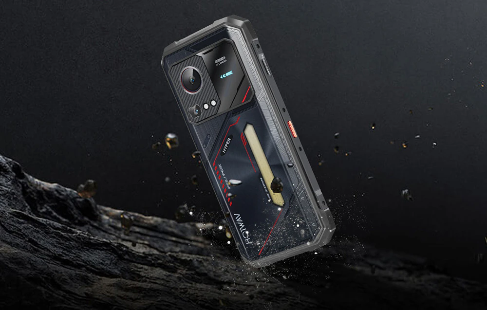 Un smartphone HOTWAV robust plutind deasupra unui teren stâncos, printre pietre sparte, sugerând rezistența la impact.