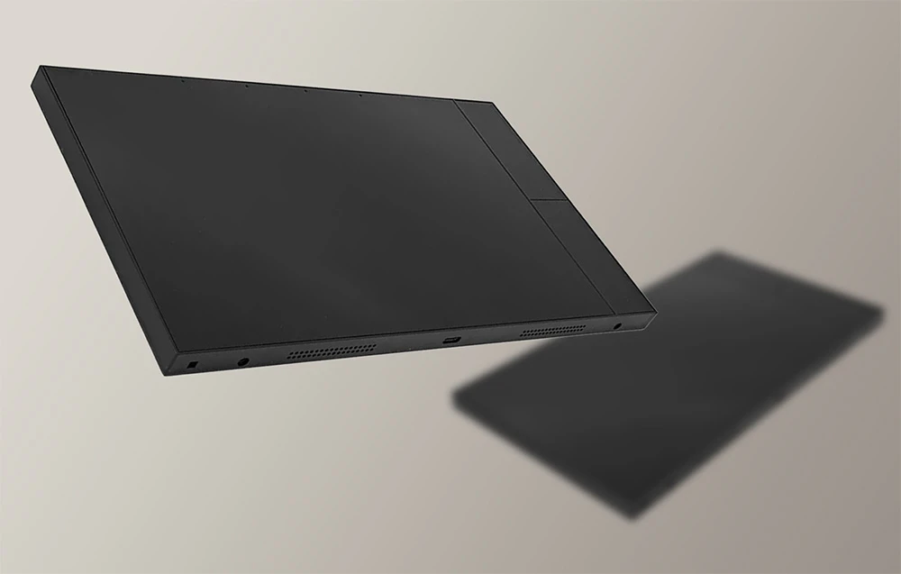 Două panouri tactile negre cu ecrane oprite pe un fundal bej