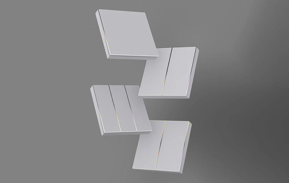 Patru panouri de încălzire albe cu un finisaj auriu subtil dispuse pe un fundal gri într-un model geometric