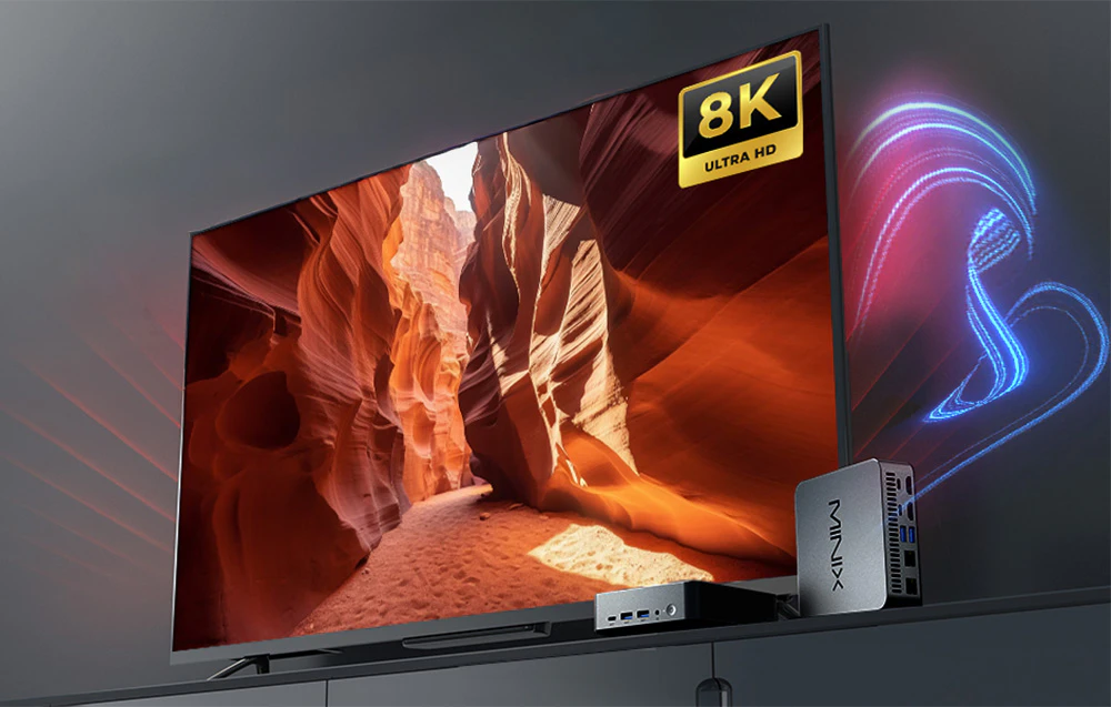 Un monitor cu calitate a imaginii 8K, lângă care se află Mini PC N512 conectat la monitor.