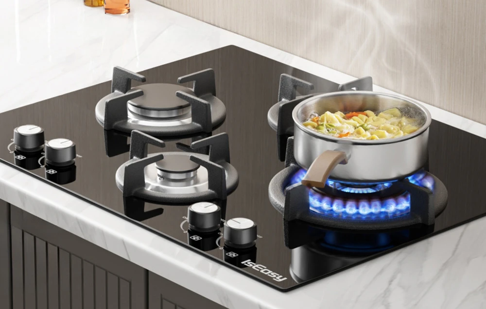 Plită pe gaz IsEasy cu o oală de legume pe o flacără albastră