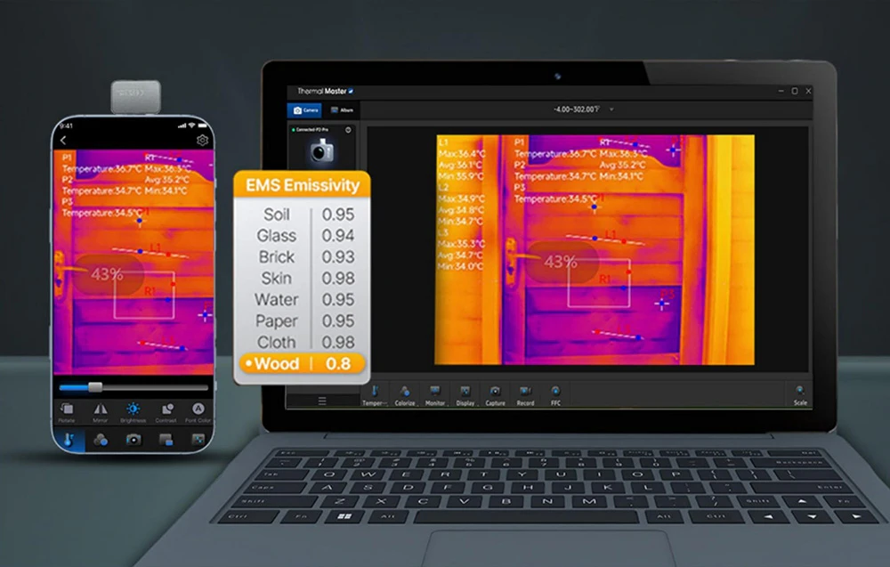 Un smartphone și un laptop afișează o imagine termică a unei uși lângă un tabel EMS de emisivitate cu valori pentru diverse materiale
