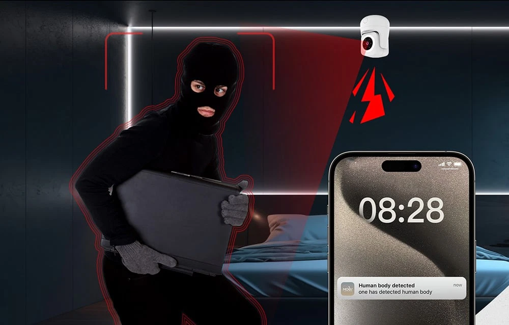 O persoană cu cagulă, cu un laptop în dormitor și un smartphone care afișează o notificare „Corp uman detectat” la ora 08:28