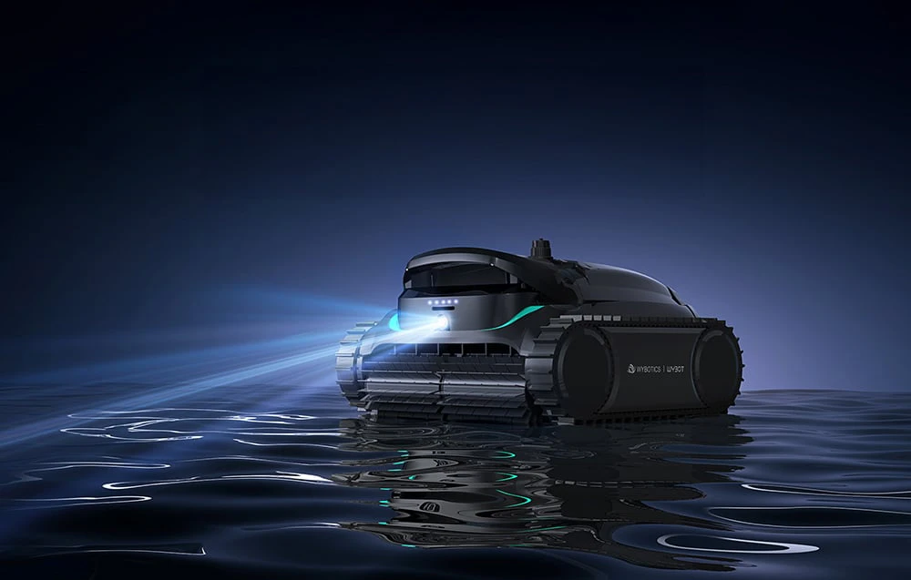 Robotul pentru piscină Wybot M2 cu iluminare albastră pe apă