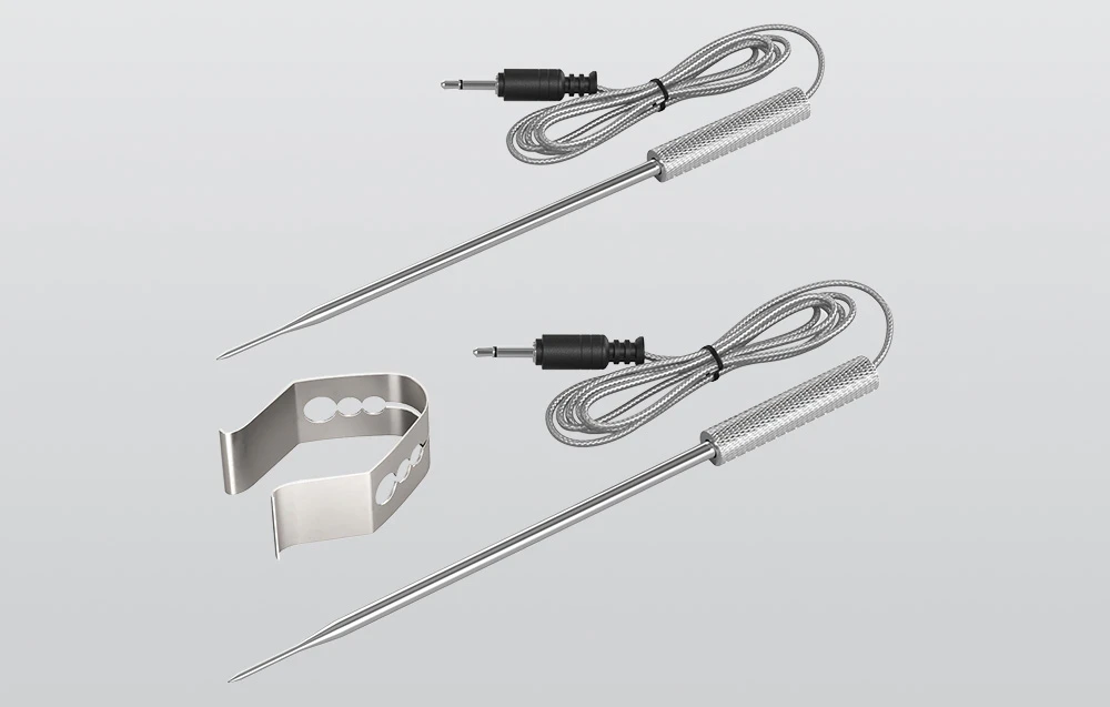 Două sonde SONOFF MPS01 cu accesorii pe un fundal gri.