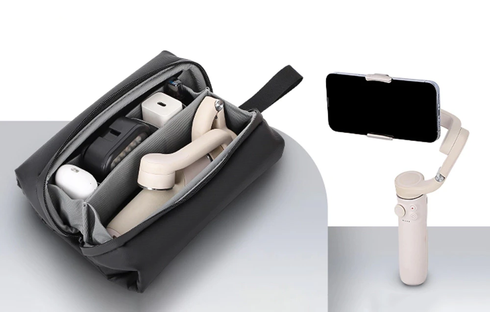 Geantă neagră deschisă cu gimbal alb și gimbal cu smartphone lângă el