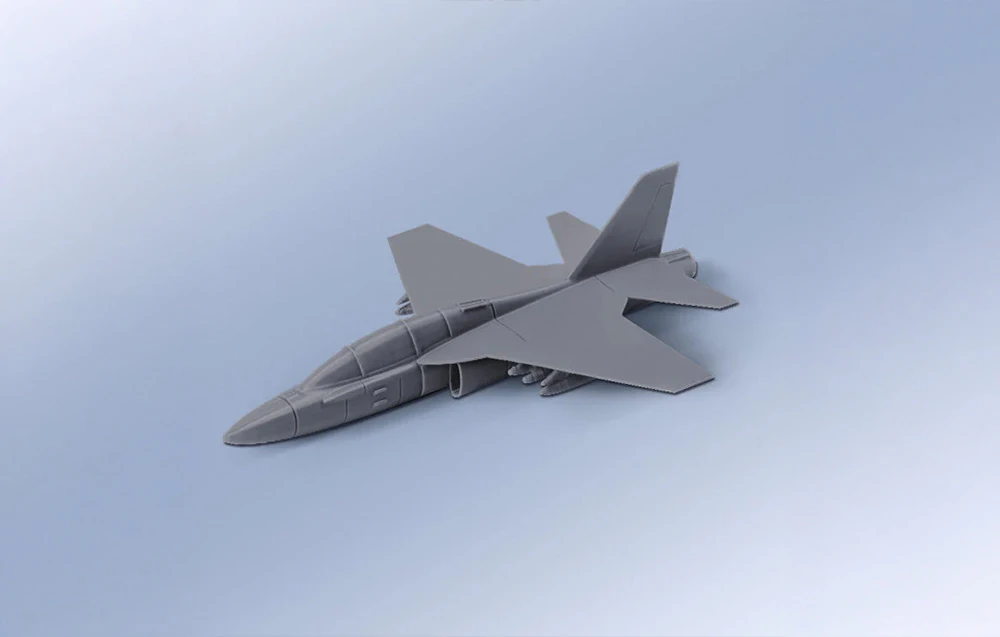 Model de avion în culoare gri, realizat cu ajutorul unei imprimante 3D.