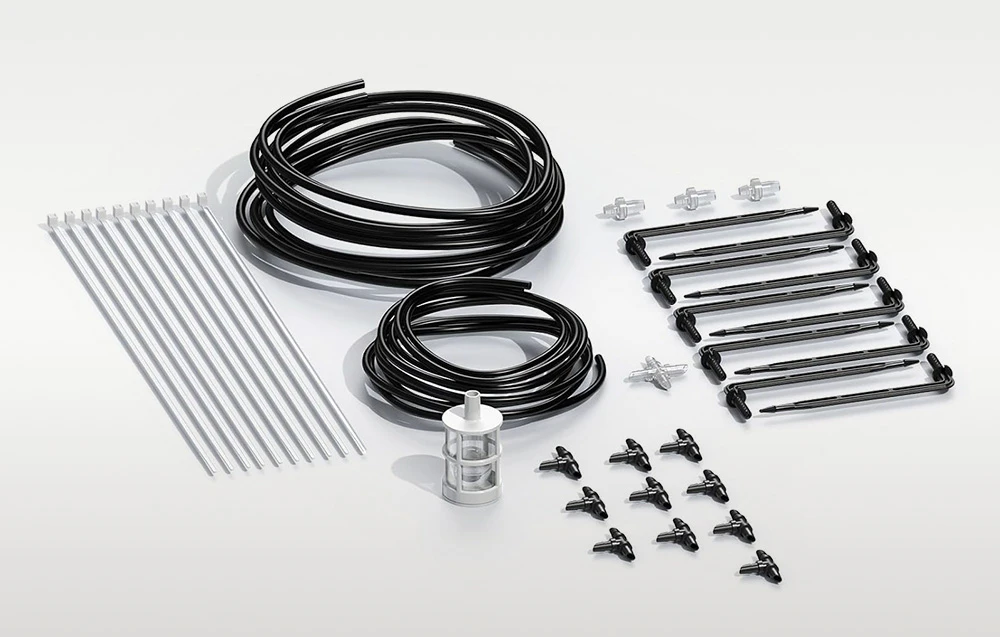 Componente pentru kitul de instalare, inclusiv cabluri, emițătoare, vârfuri, legături zip, teuri, conectori și filtru așezate unul lângă altul