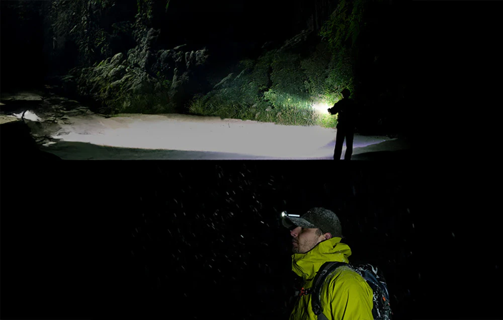 Un bărbat luminează o peșteră cu lanterna Flextail Zero 1200 în timp ce o explorează