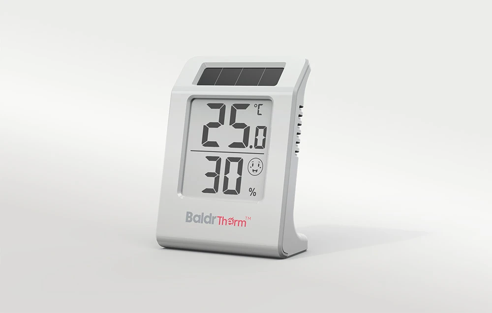 Termohigrometru Baldtherm pe un fundal gri deschis