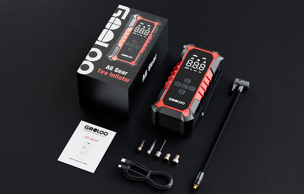 Set compresor GOOLOO cu cutie, cablu, duze și manual pe fundal negru