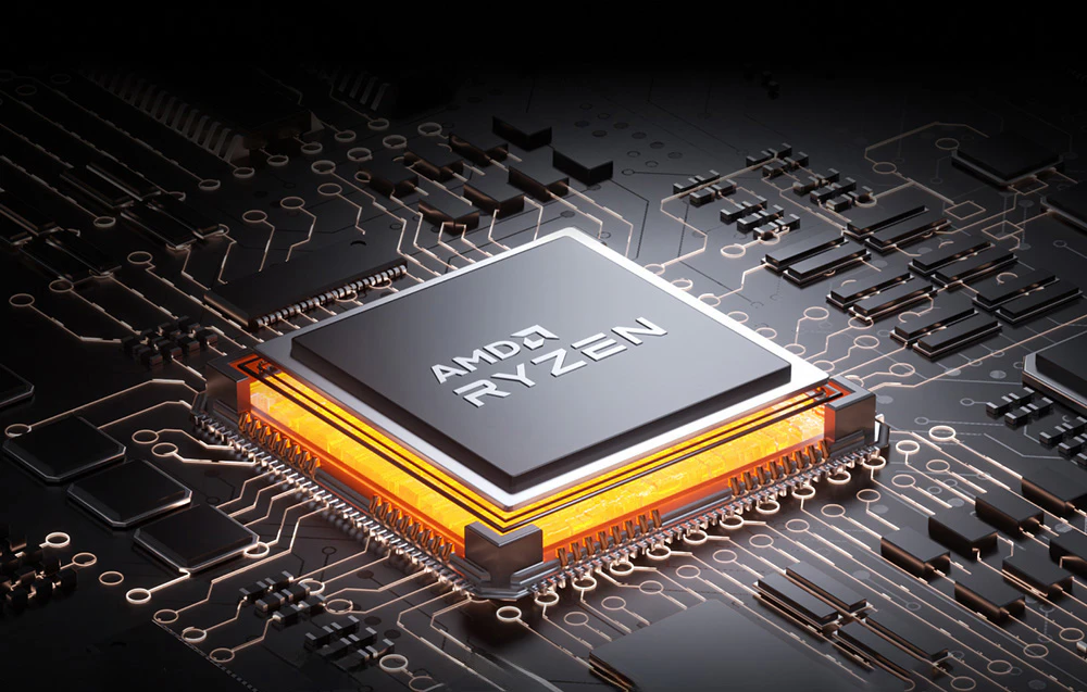 Procesor AMD Ryzen pe placa de bază cu margini aurii iluminate și căi electronice vizibile