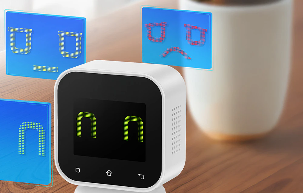 Monitor de calitate a aerului care afișează emoticoane animate care indică calitatea aerului.