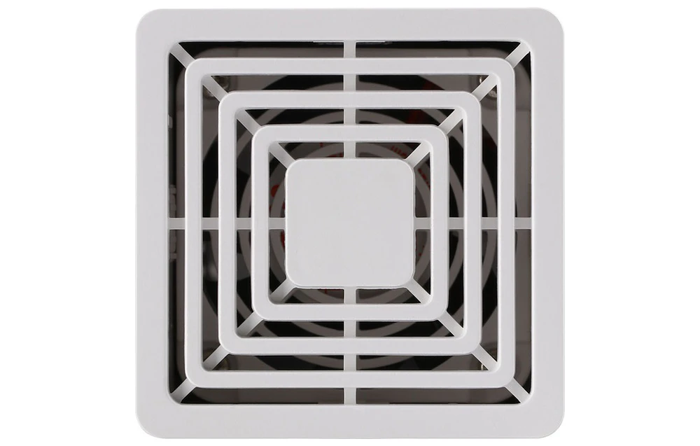 Vedere de sus a grilei de ieșire pătrate a purificatorului, cu palele ventilatorului vizibile în interior.