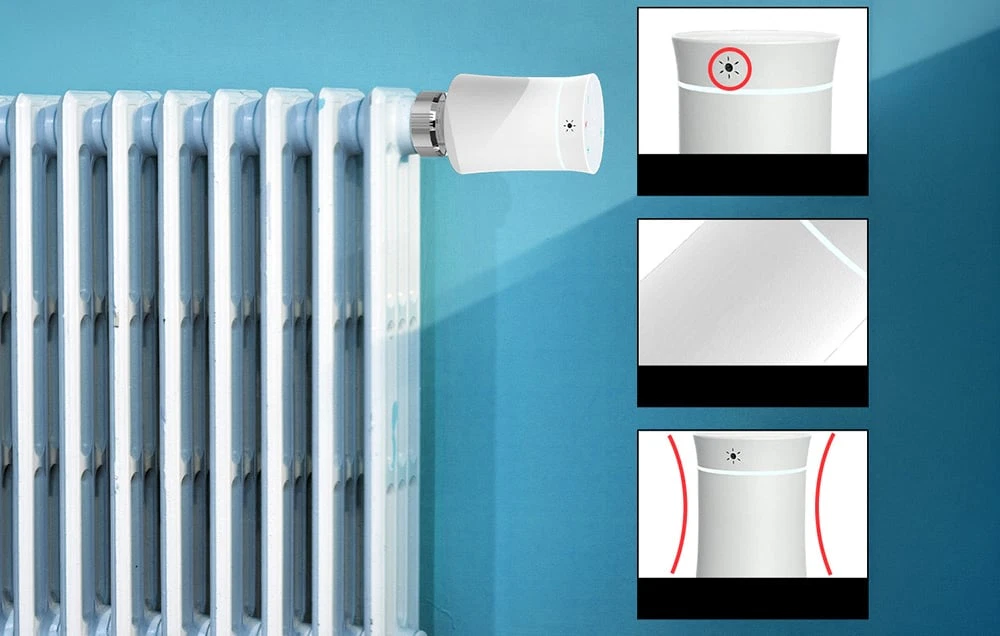 Un cap termostatic inteligent alb montat pe un radiator pe un perete albastru.