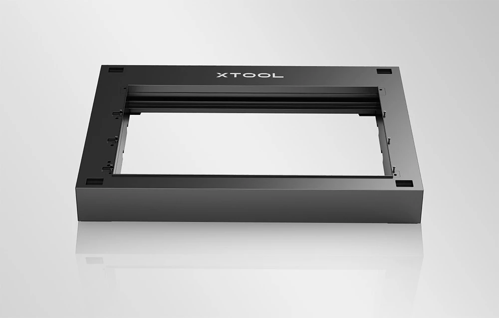 Placă de ridicare xTool neagră pe fundal gri