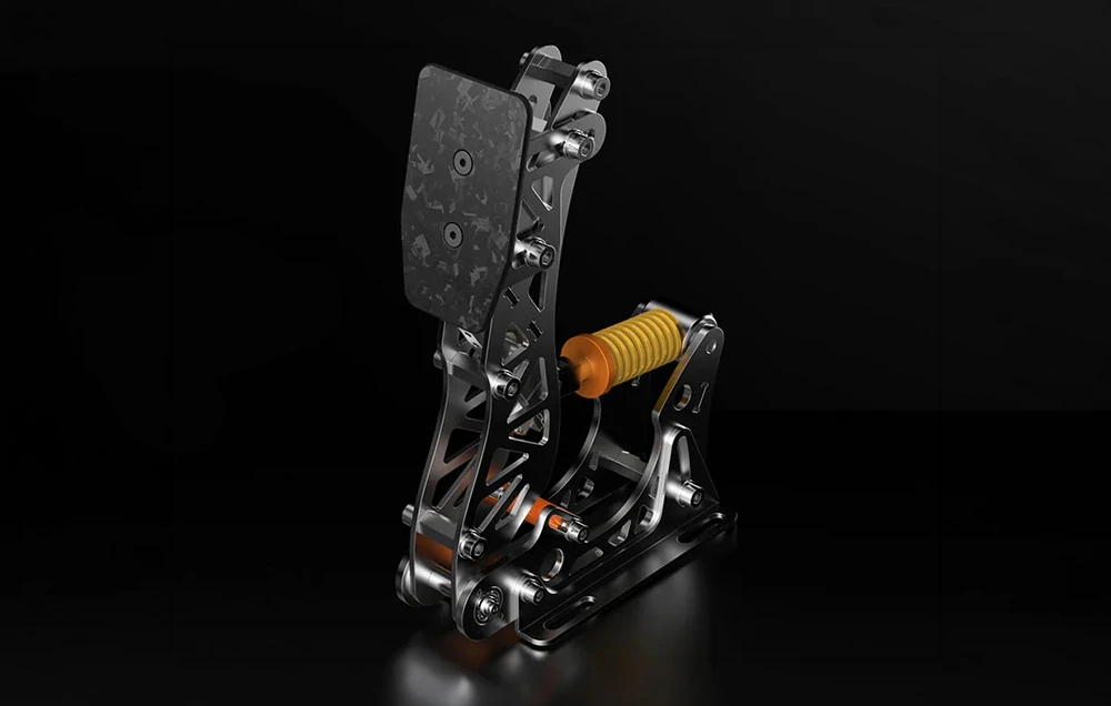 Pedală de curse PXN din metal, cu capac din fibră de carbon și arc galben pe fundal negru