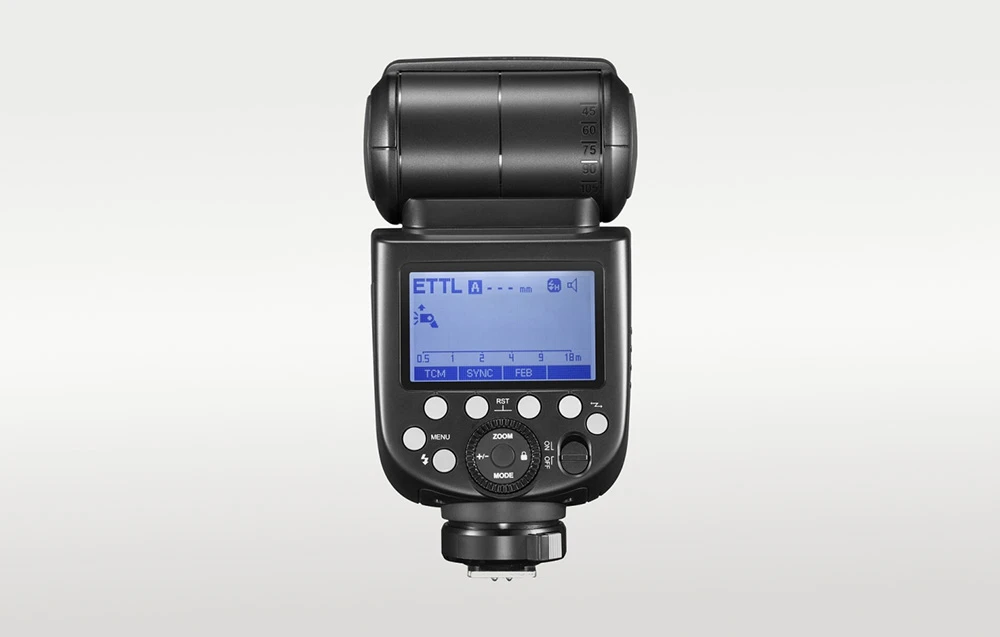 Vedere din spate a blițului Godox TT685II cu ecranul LCD albastru aprins, butoane și cadranul de control