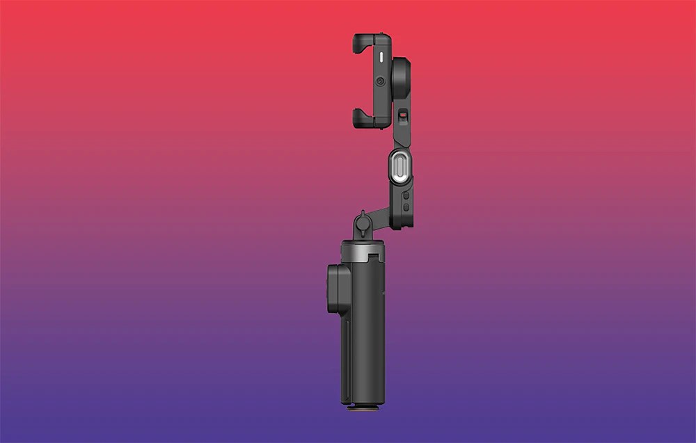Gimbal în forma sa pliată, compactă, prezentat din lateral pe un fundal cu gradient roșu-violet.