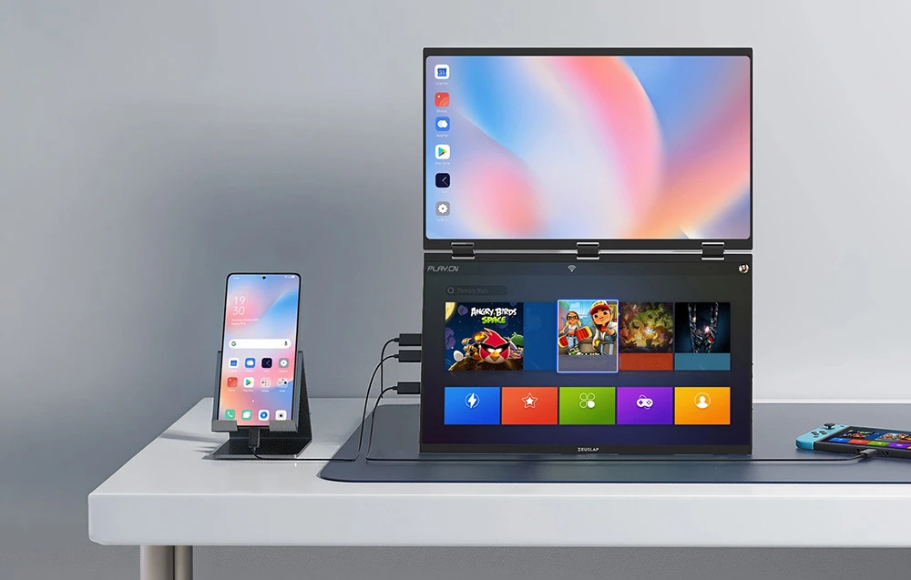 Smartphone conectat la monitorul pliabil ZEUSLAP cu două ecrane care afișează aplicații și jocuri