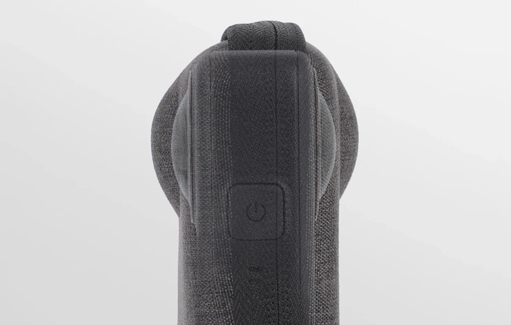 Husă din material textil gri cu închidere cu fermoar și curea Velcro, vedere din față cu fundal deschis