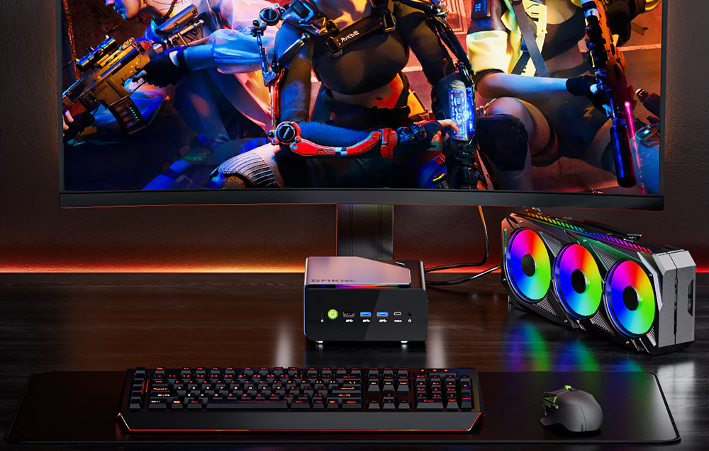 Kit de gaming cu mini PC GMKtec, monitor de gaming, răcire GPU colorată și tastatură retroiluminată