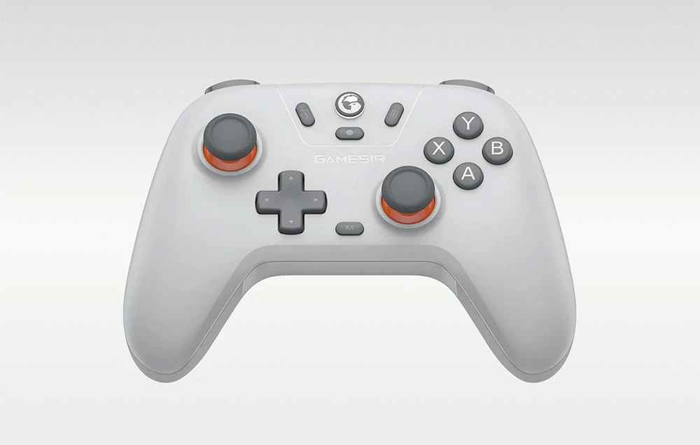 Controler de jocuri gri pe un fundal gri deschis