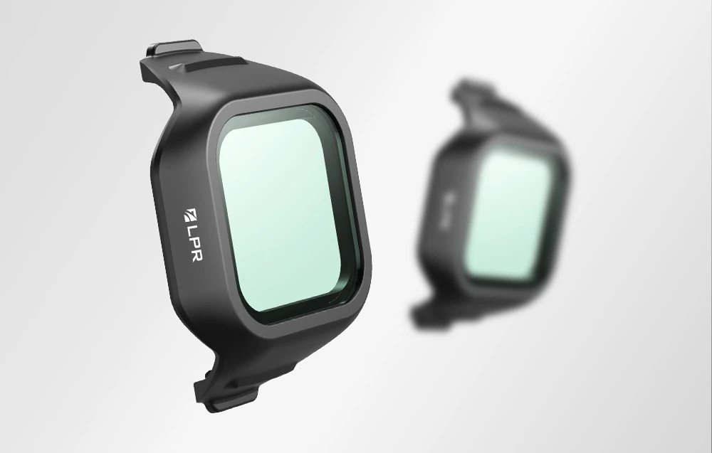 Filtru LPR pentru dronă cu sticlă de mentă într-un cadru negru - una clară în prim-plan, cealaltă neclară în fundal