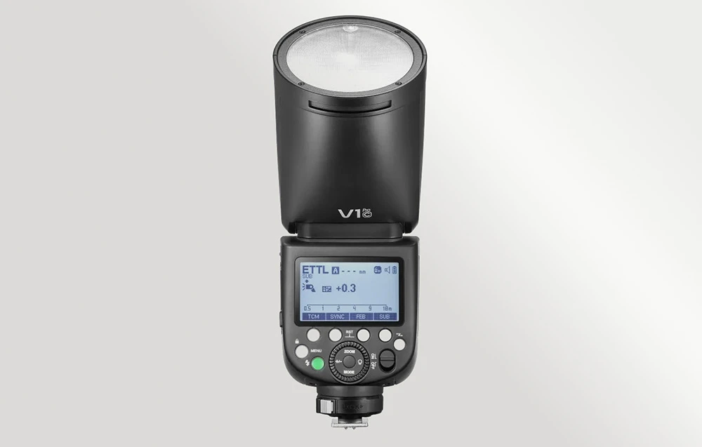 Panoul din spate al blițului Godox V1Pro C cu afișaj LCD retroiluminat și butoane de control