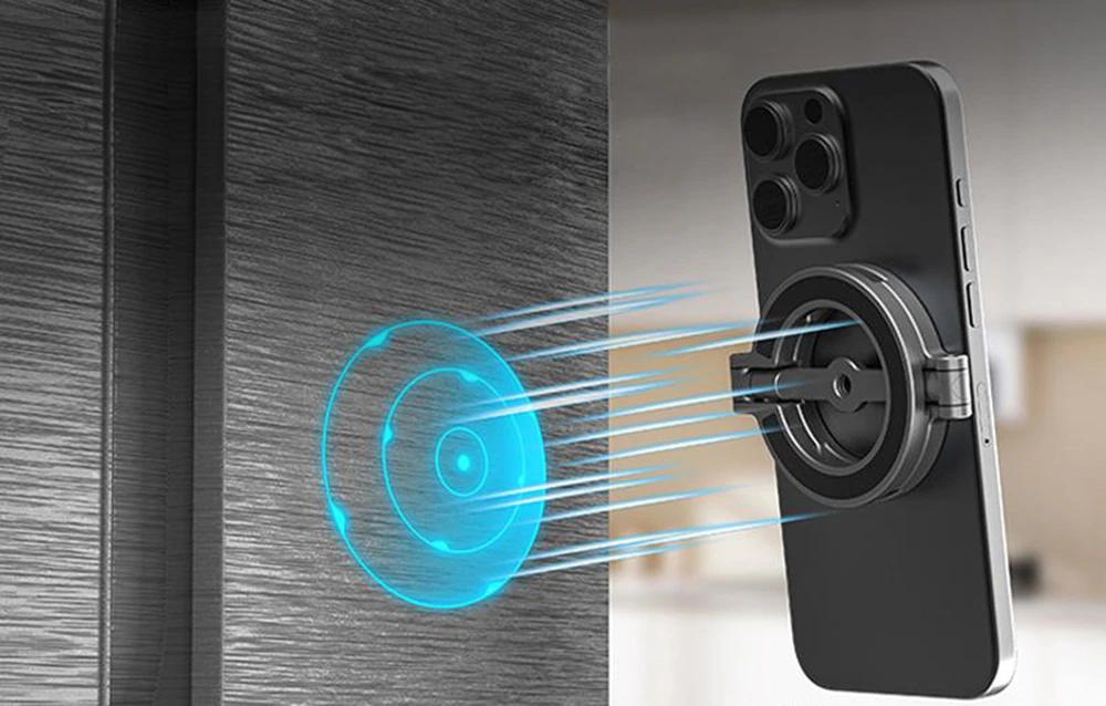iPhone negru atras magnetic de frigider cu vizualizarea câmpului magnetic albastru