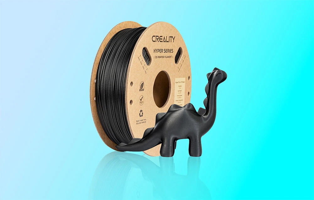 Bobină de filament Creality Hyper Series cu o figură neagră de dinozaur pe un fundal turcoaz