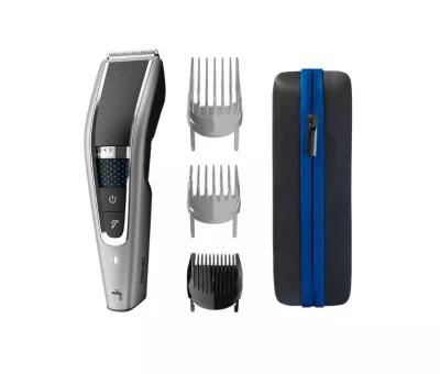 Aparat de tuns PHILIPS Seria 5000 HC5650/15, Tehnologie Trim-n-Flow Pro, Lame otel inoxidabil, Cu/fara fir, Baterie tip Li-Ion (90 min utilizare fara fir/1h incarcare), 100% lavabil, Gri, L x A x I (mm) 70x193x227